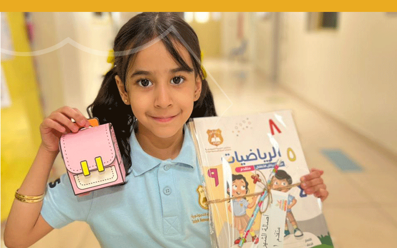 Kindergartners Receive School Books as they embark on their academic year